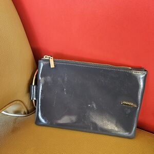 Thacker wristlet clutch